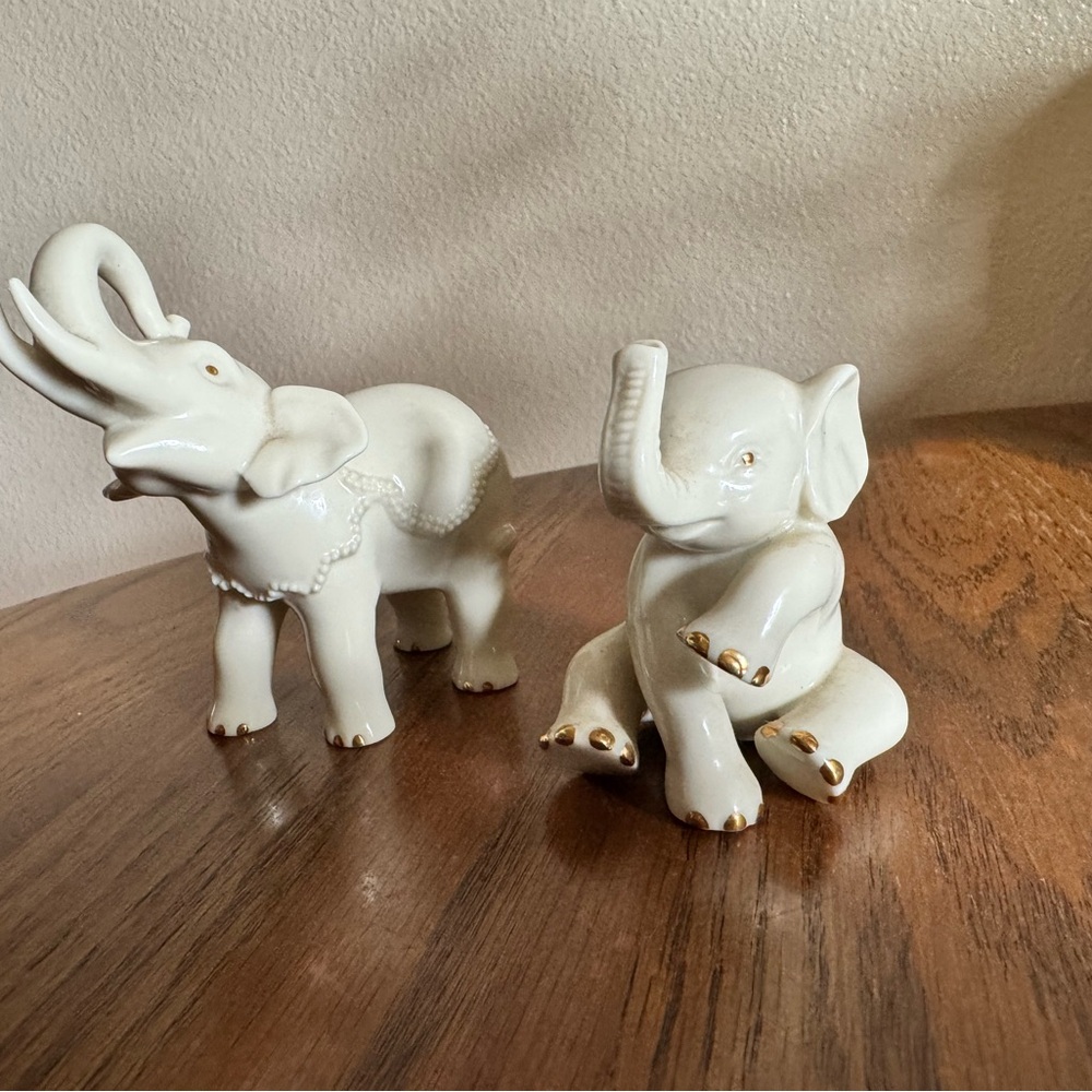 Lenox White Porcelain Elephant Figurines with Gold Accents.
